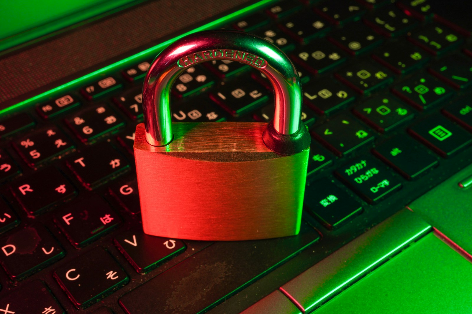 red padlock on black computer keyboard symbolizing Cyber Liability Insurance and Who Is Vulnerable to a Cyberattack?